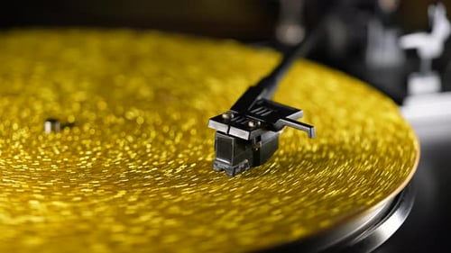 Gold Record Spinning on a Turntable Close Up