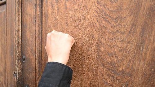 Knocking on Wooden Door