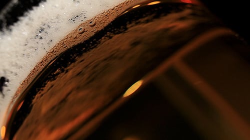 Beer Pouring into Glass Close Up