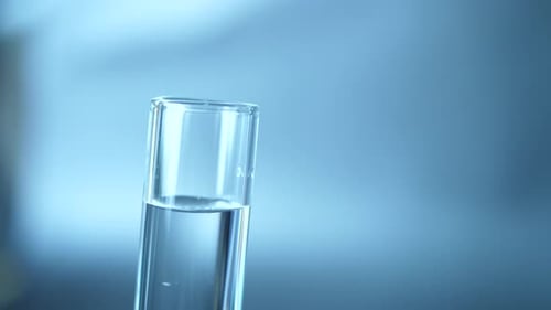 Liquid Being Added to Test Tube with Pipette