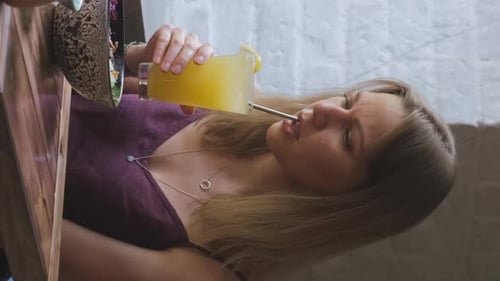 Attractive Woman Having Lunch at Cafe
