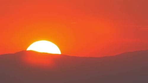 Sun Goes Down Behind A Hill