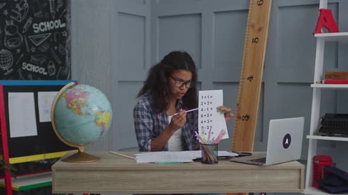 Enthusiastic Teacher Teaching Online Math Lesson