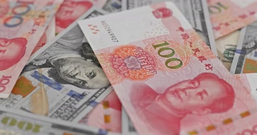 Mixed US Dollars and Chinese Yuan Close Up