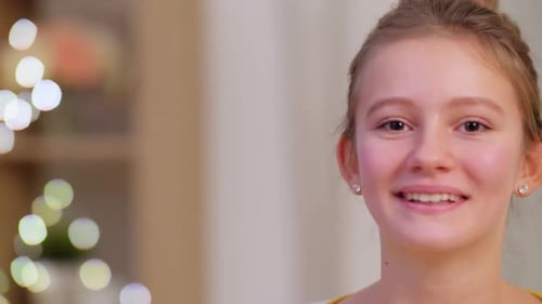 Smiling Teen Girl Close Up Portrait Indoors