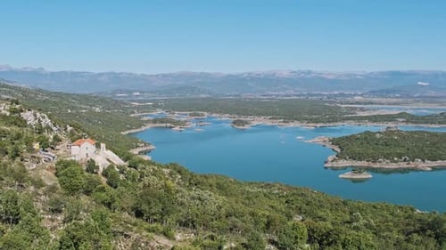 Panoramic View of a Large Blue Lake with Islands in Montenegro