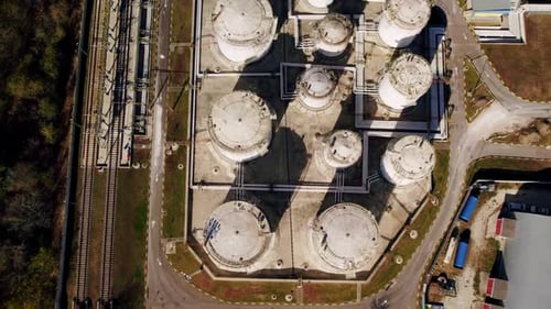 Aerial View of Industrial Storage Tanks and Pipes