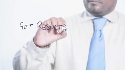 Person Writes Get Results With a Marker