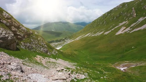 Aerial Shot Valley and Slopes of Beautiful Caucasus Mountains, Covered with Dense Green Grass