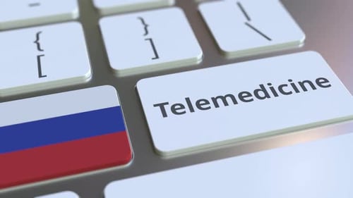 Telemedicine Button Press with Russian Flag on Keyboard