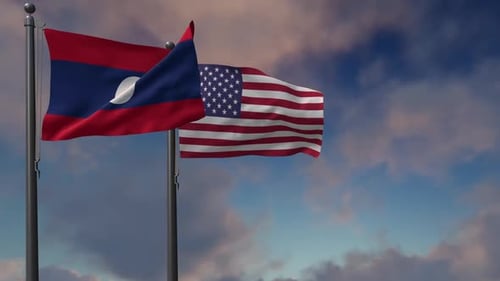 Laos and USA National Flags Waving Against Blue Sky