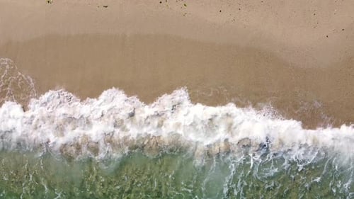 Aerial View of Clear Turquoise Sea and Waves