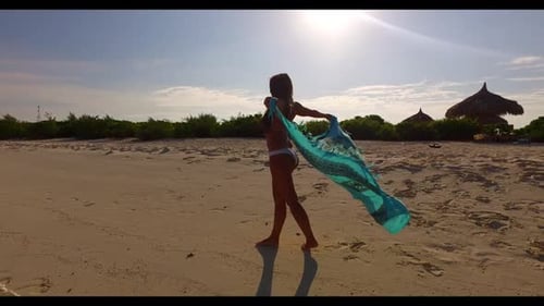 One girl tans on tranquil lagoon beach journey by blue green sea and white sand background of the Ma