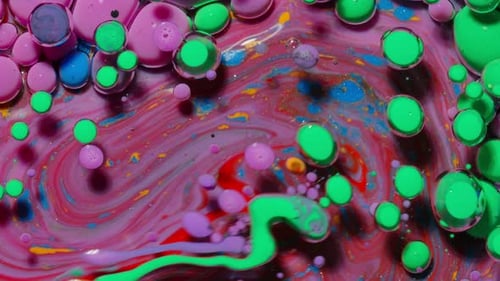 Abstract Macro Footage of Colorful Paint Mixing and Bubbles