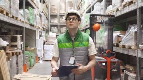 Young Worker Is Checking His List, Supervisor.