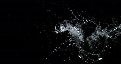 Water Splashing in Slow Motion on Black Background