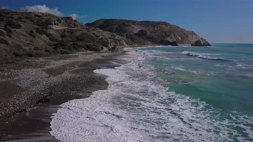 Aerial Top View Waves Break on Beach