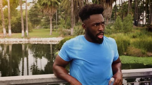 Athlete man working out in the park