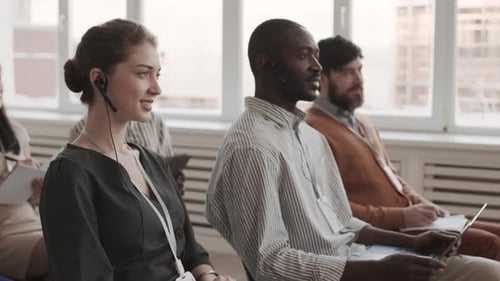 Attendees Listening at a Corporate Conference