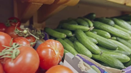 Large variety of vegetables and fruits on a supermarket shelves