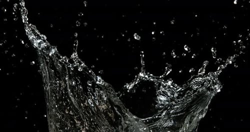 Water Splashing Against Black Backdrop