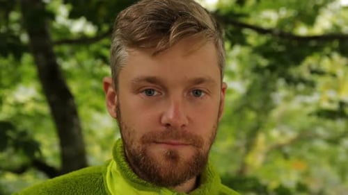 Close Up of Smiling Man Outdoors in Nature