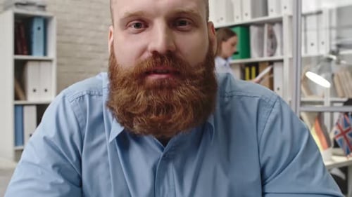 Office Worker Talking via Video Call with Partner
