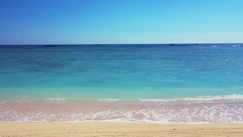 Aerial scenery of perfect coast beach vacation by turquoise sea with white sandy background of a day
