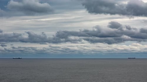 Timelapse Cargo Ships at Sea Stormy Sea Thunderclouds
