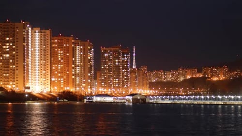 Time Lapse of the Lights of the Night City on the Coast