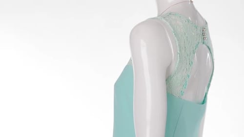 Sleeveless Turquoise Lace Dress Rotating on Mannequin