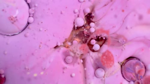 Slow Motion of Bright Colored Bubbles.
