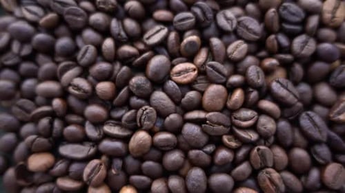 Pile of Rich Coffee Beans Zooming In