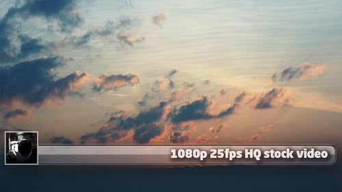 Clouds Drifting in a Colorful Sky at Sunset