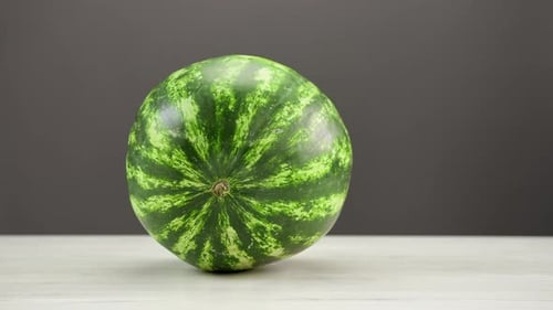 Closeup Fresh Watermelon Lying Turning on Wooden Table Ready to Eating Summer Vitamin Dessert