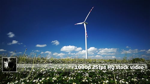 Wind Turbine Generating Power in Sunny Rural Field