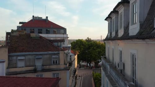 Close Up Aerial Dolly Out View of Old Traditional Colorful Buildings Along the Residential Street in
