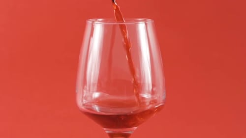 Cherry juice in a glass.