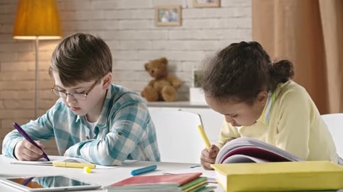 Kids Drawing at Desk
