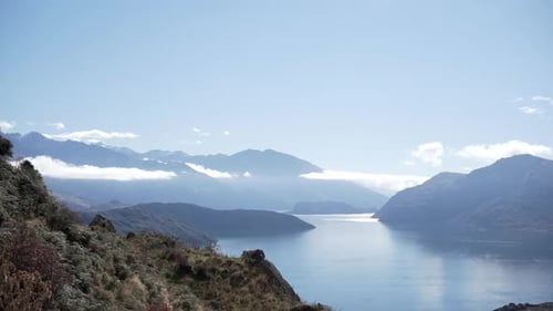 Lake at picturesque mountain valley on cloudy day