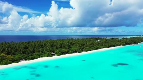 Aerial drone shot seascape of luxury sea view beach break by shallow lagoon and white sandy backgrou