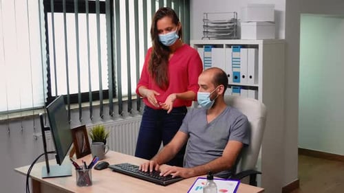 Young Employees Working in New Office