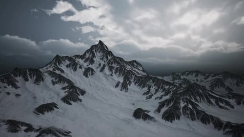 Flying Over Snow Covered Mountain Range