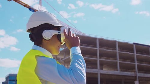 Workplace of freelance worker at home office. Young man works using computer.