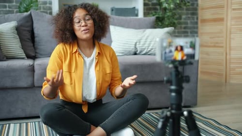 Woman Vlogging in her Home Studio