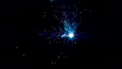 Heavy Industry Welder Welds Metal Parts for Car Repair