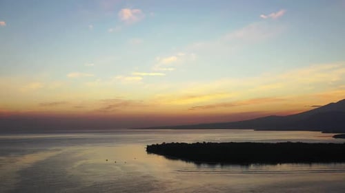 Vivid Sunset At The Beach. Aerial Magic Hour Shot Above The Calm Sea
