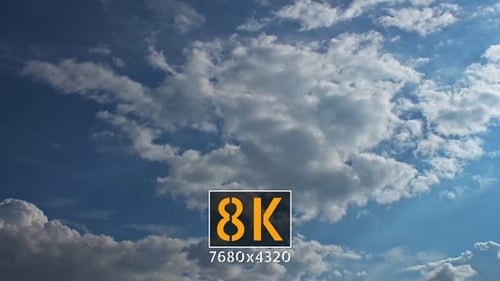 Clouds Passing in Blue Sky Time-Lapse