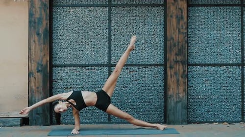 Young beautiful woman practicing yoga. Wellness concept. Calmness and relax, woman happiness. Toned