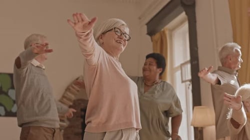 Seniors Doing Exercises in Nursing Home